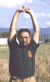 A photograph of Anil Mitra at home in the Mad River flood plain in Arcata, California