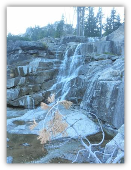 A waterfall in a rocky area