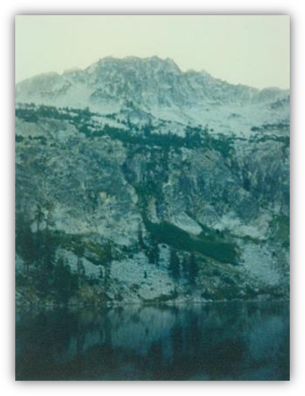 A mountain and lake with trees